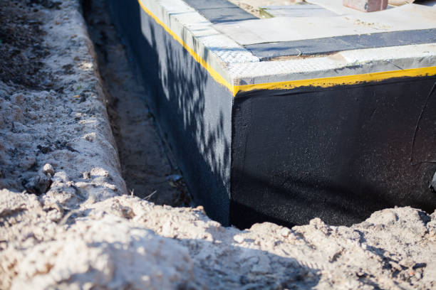 Professional Waterproofing technician working in Wauconda, IL